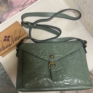 NWT, Patricia Nash leather crossbody in sage green .